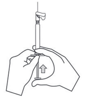 Diagram of a person holding the syringe with the needle pointing up, pressing the plunger rod upward.